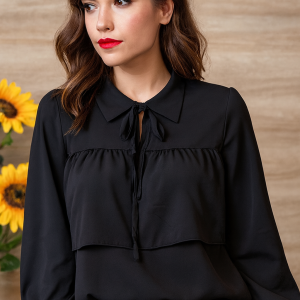 Blusa negra con volantes y lazo en el cuello